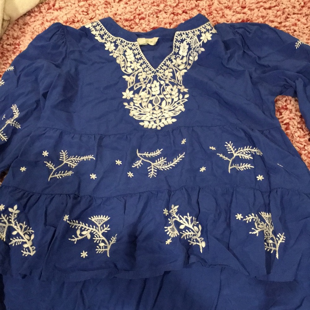 A medium Luna Moon blouse worn a few times.